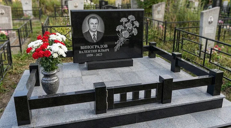 Памятник с гравировкой гвоздик — выполненная работа «Виноградов» в Томске