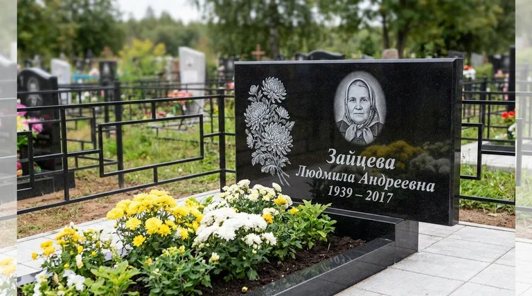 Памятник с гравировкой хризантем — выполненная работа «Зайцева» в Томске