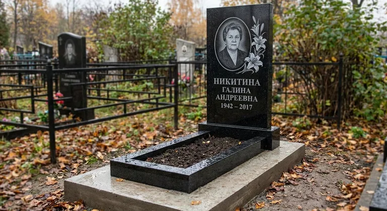 Памятник с гравировкой лилий — выполненная работа «Никитина» в Томске