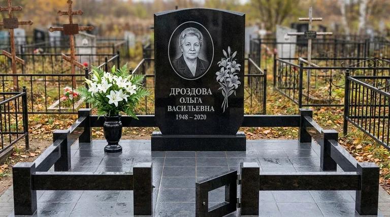 Памятник с гравировкой лилий — выполненная работа «Дроздова» в Томске