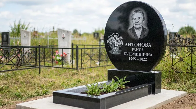Памятник с гравировкой ромашек — выполненная работа «Антонова» в Томске