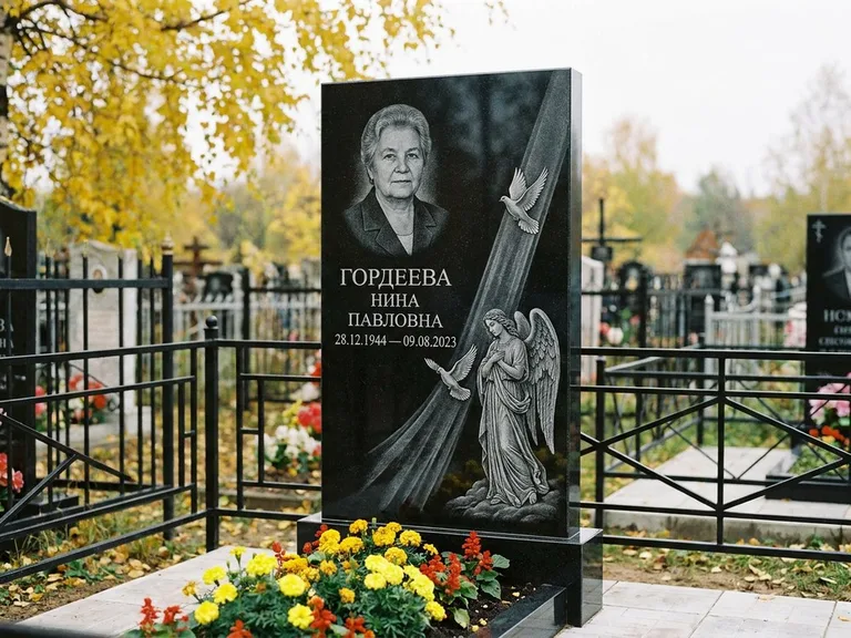 Памятник с гравировкой ангела — гравировка ангела с голубем по диагонали стелы, работа «Гордеева» в Томске