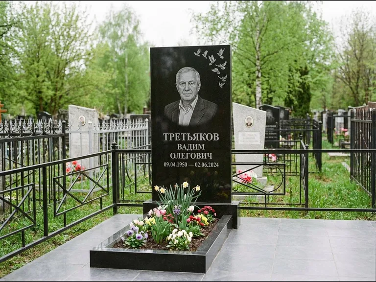 Памятник с гравировкой голубей — гравировка стаи голубей, взлетающей от угла стелы, работа «Третьяков» в Томске