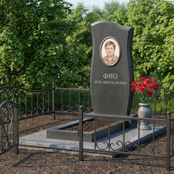 Памятник из тёмного базальта вертикальный с гравировкой портрета