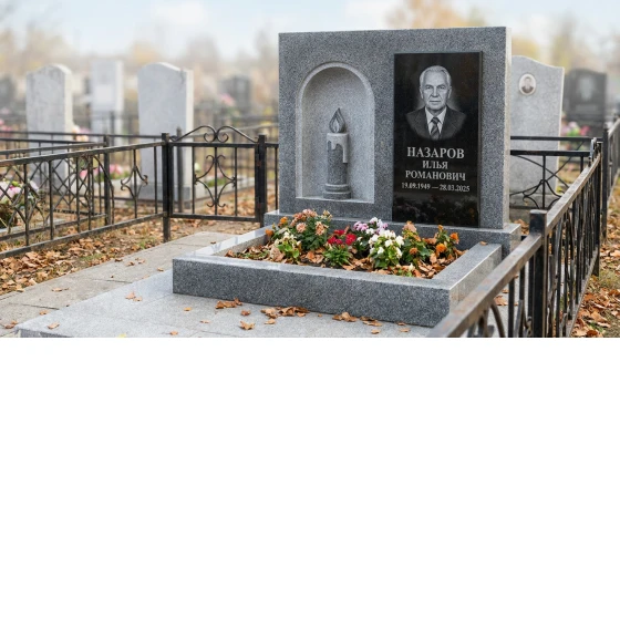 Памятник с горящей свечой в арочной нише из мансуровского гранита