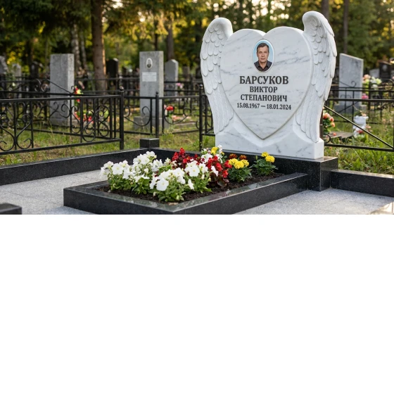 Мемориал с сердцем и парящими крыльями из белого мрамора