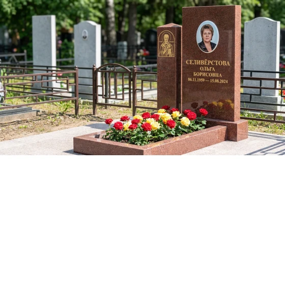 Памятник с иконой николая чудотворца из дымовского гранита с позолотой